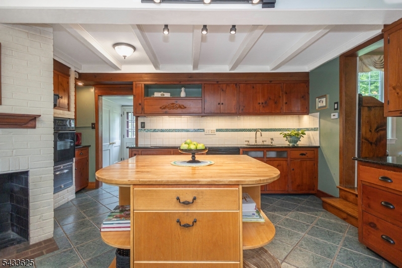 449 Stamets Road Milford, NJ 08848 - Photo 13 of 44 a kitchen with stainless steel appliances kitchen island a stove a sink and a refrigerator
