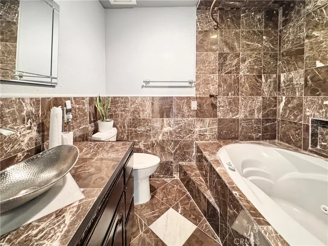 a bathroom with a sink and a toilet