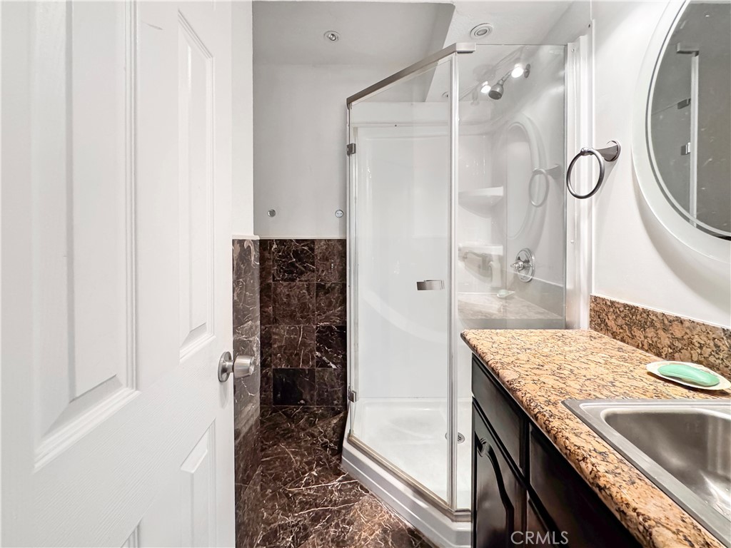 20224 Sherman Way, Unit 14 Winnetka, CA 91306 - Photo 9 of 20 First Floor Common Restroom