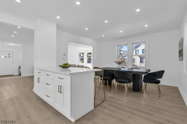 a kitchen with cabinets and sink