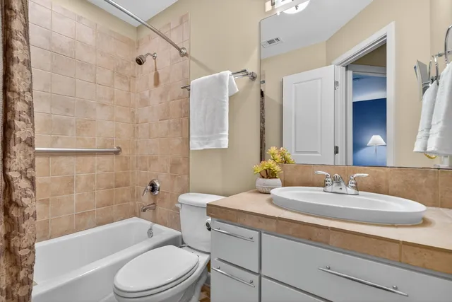 a room with furniture and air hockey table