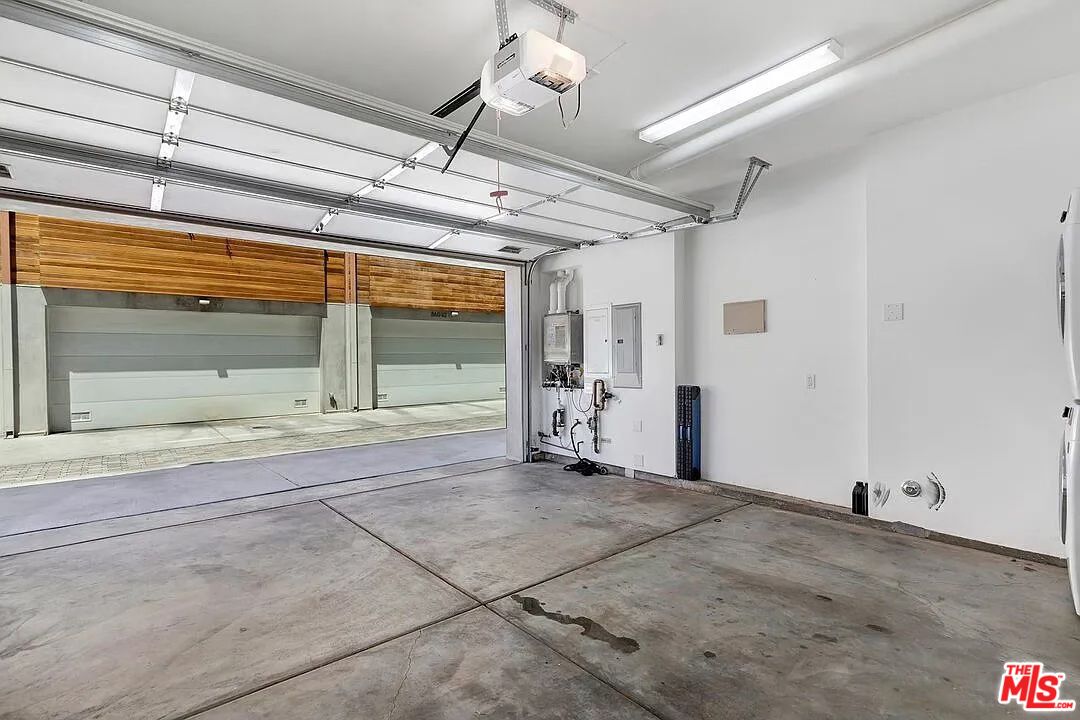 866 South Wilton Place Los Angeles, CA 90005 - Photo 16 of 17 a view of a room with wooden floor and windows