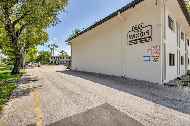 a view of a street sign of a house