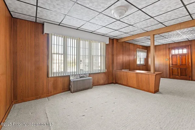 a view of a bathroom from a hallway