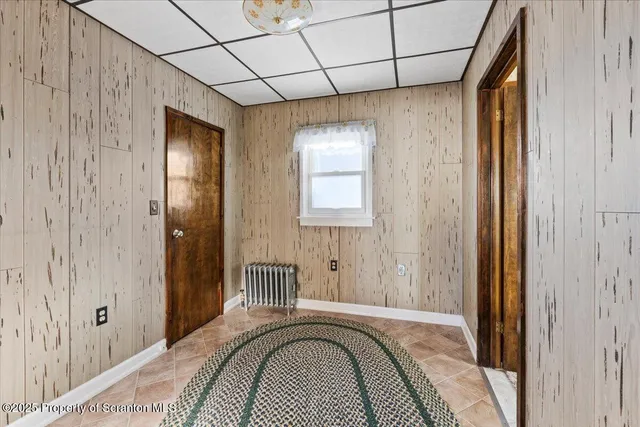 a view of a room with a large window