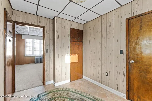a view of a bathroom with a tub and shower