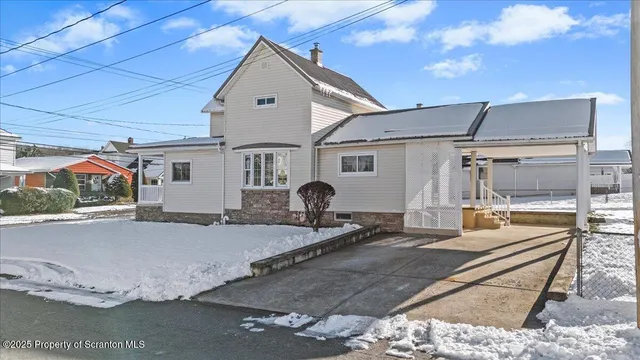 a view of balcony with furniture