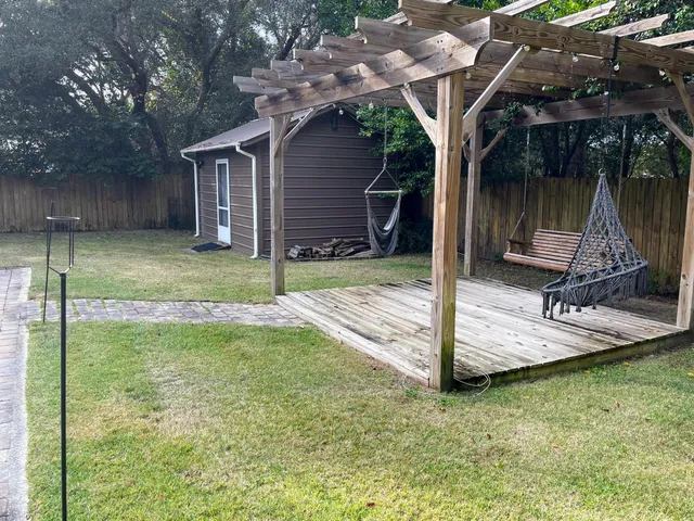 a view of a playground with basketball court