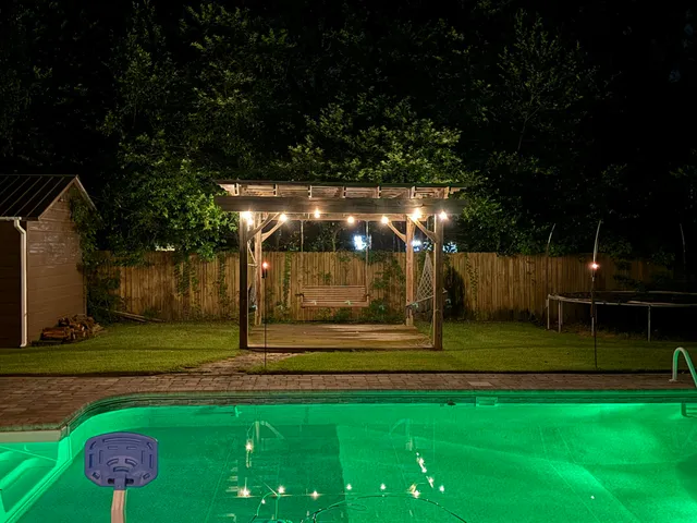 a view of a backyard with a garden