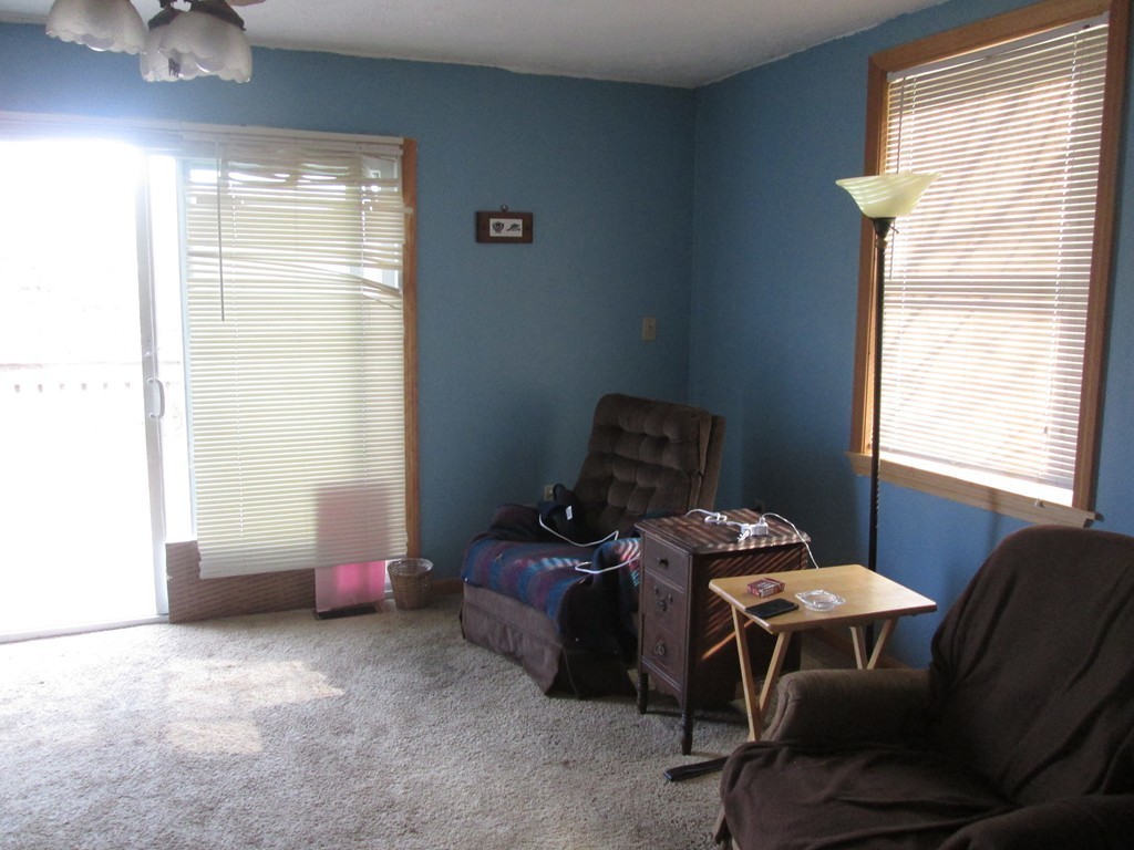33 Douglas Road Webster, MA 01570 - Photo 12 of 13 a livingroom with workspace and a window