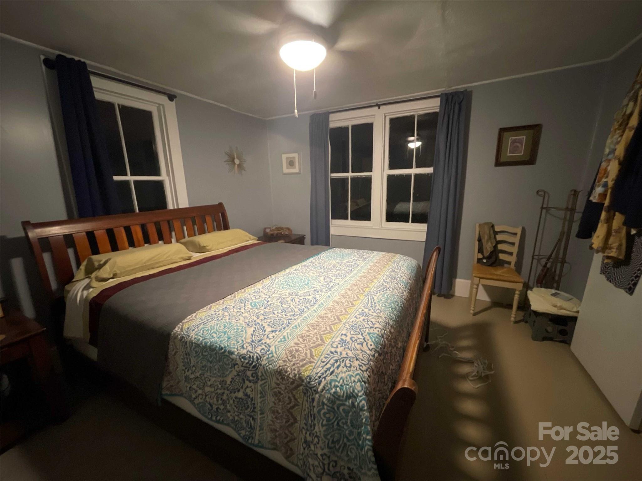 37 South US 19e Highway Newland, NC 28657 - Photo 12 of 16 a bedroom with a bed next to a window