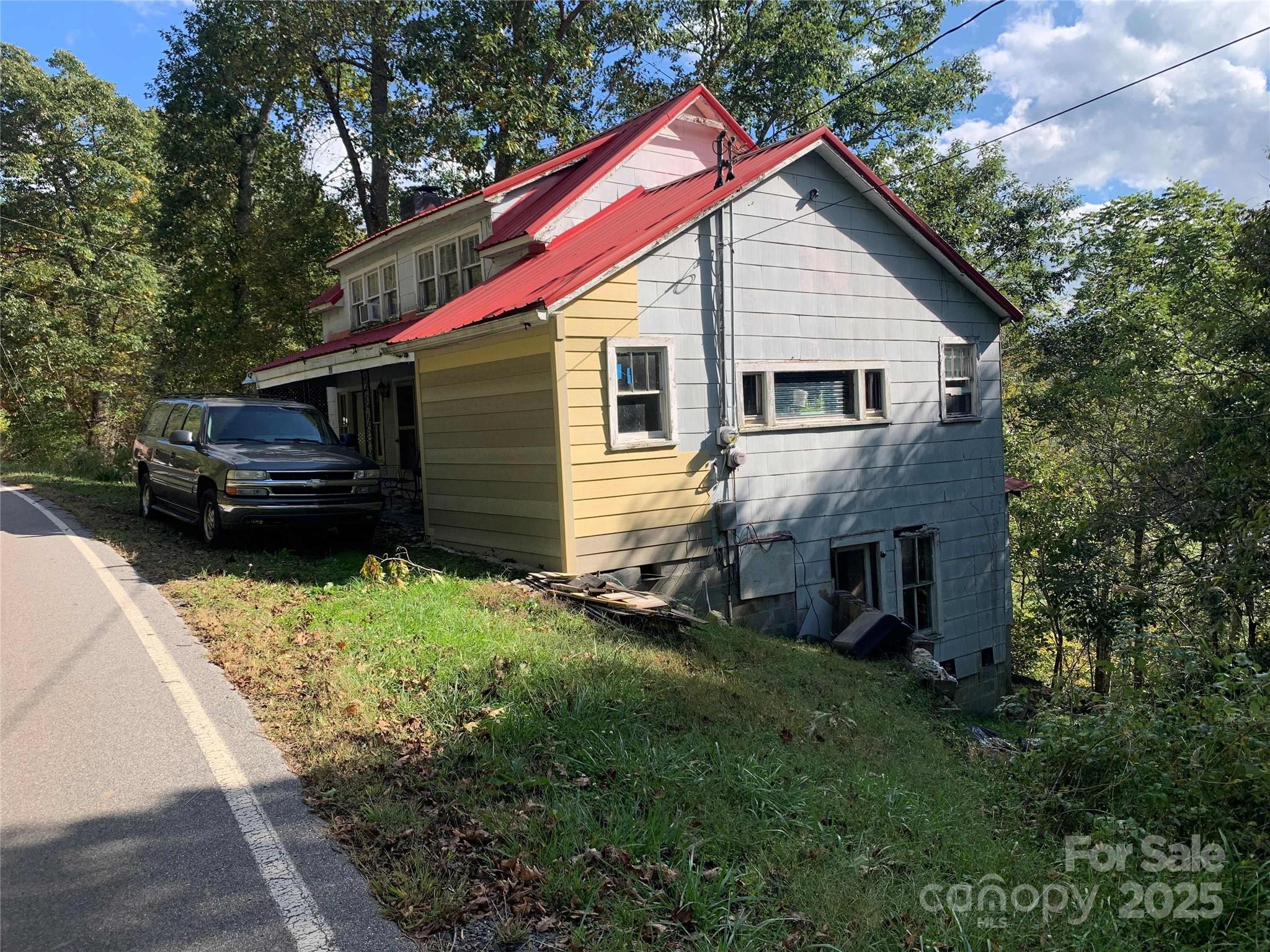 37 South US 19e Highway Newland, NC 28657 - Photo 3 of 16 a view of a house with a backyard