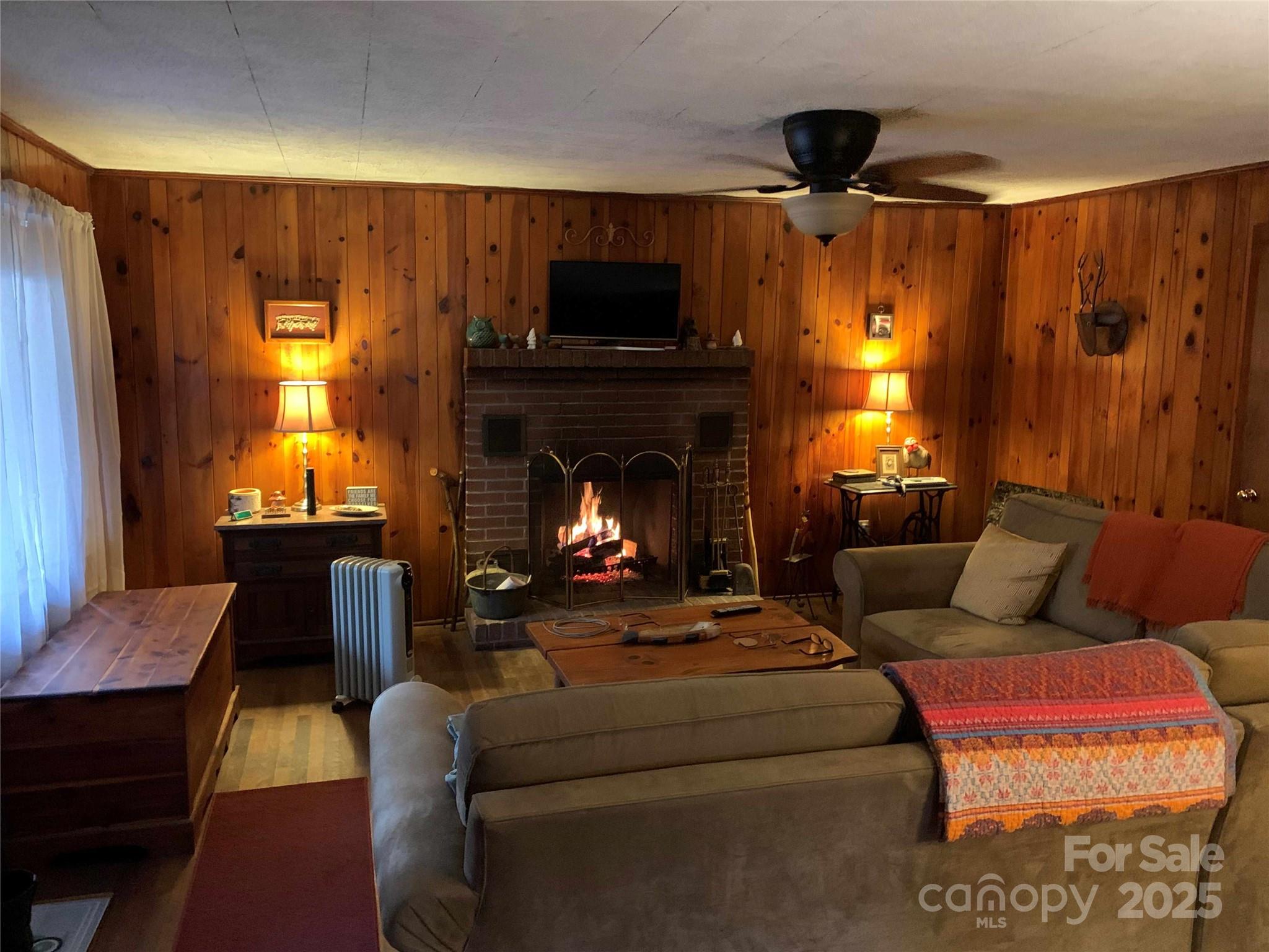37 South US 19e Highway Newland, NC 28657 - Photo 4 of 16 a living room with furniture and a fireplace