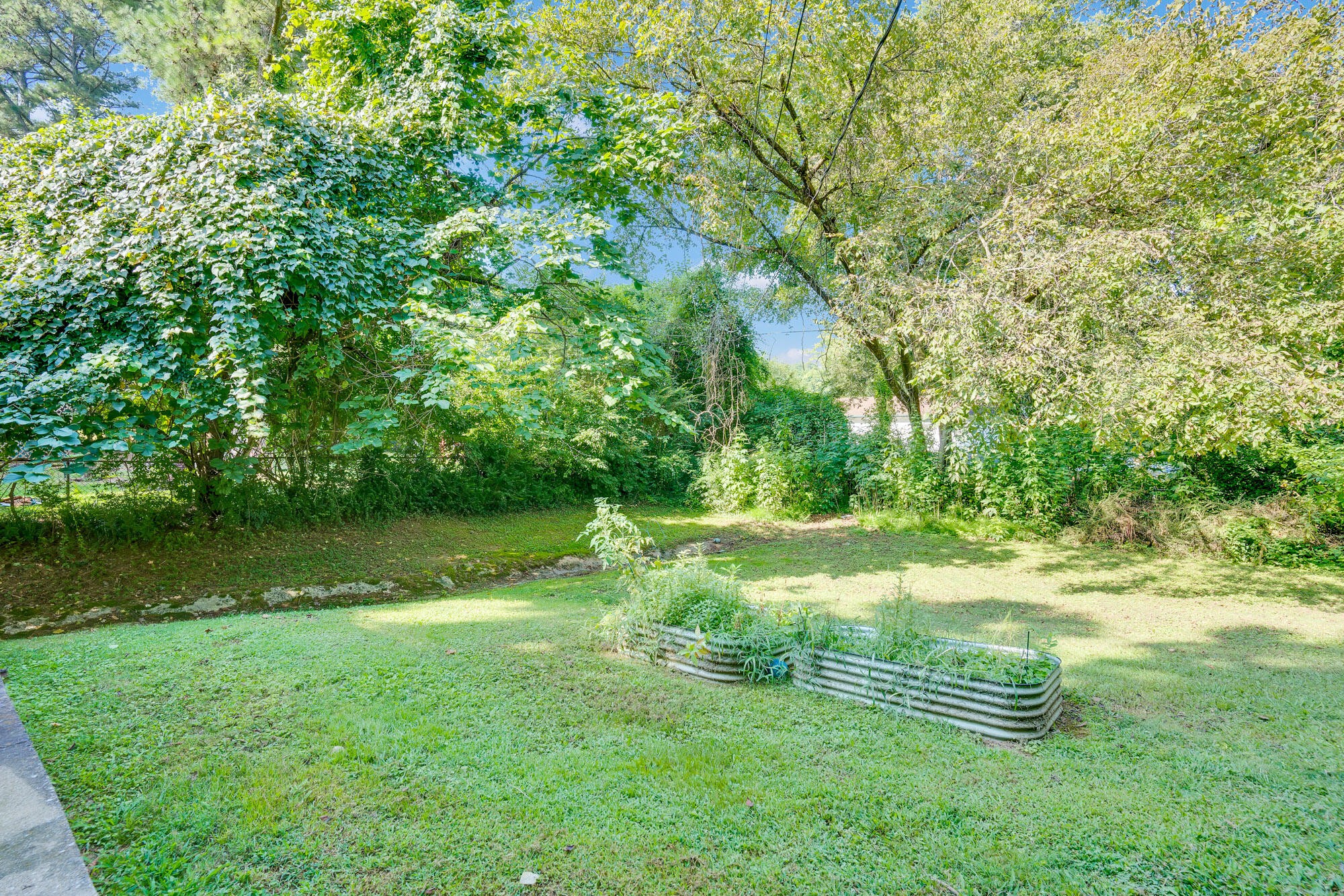 5961 Congress Lane Harrison, TN 37341 - Photo 27 of 30 a view of a golf course with a lake