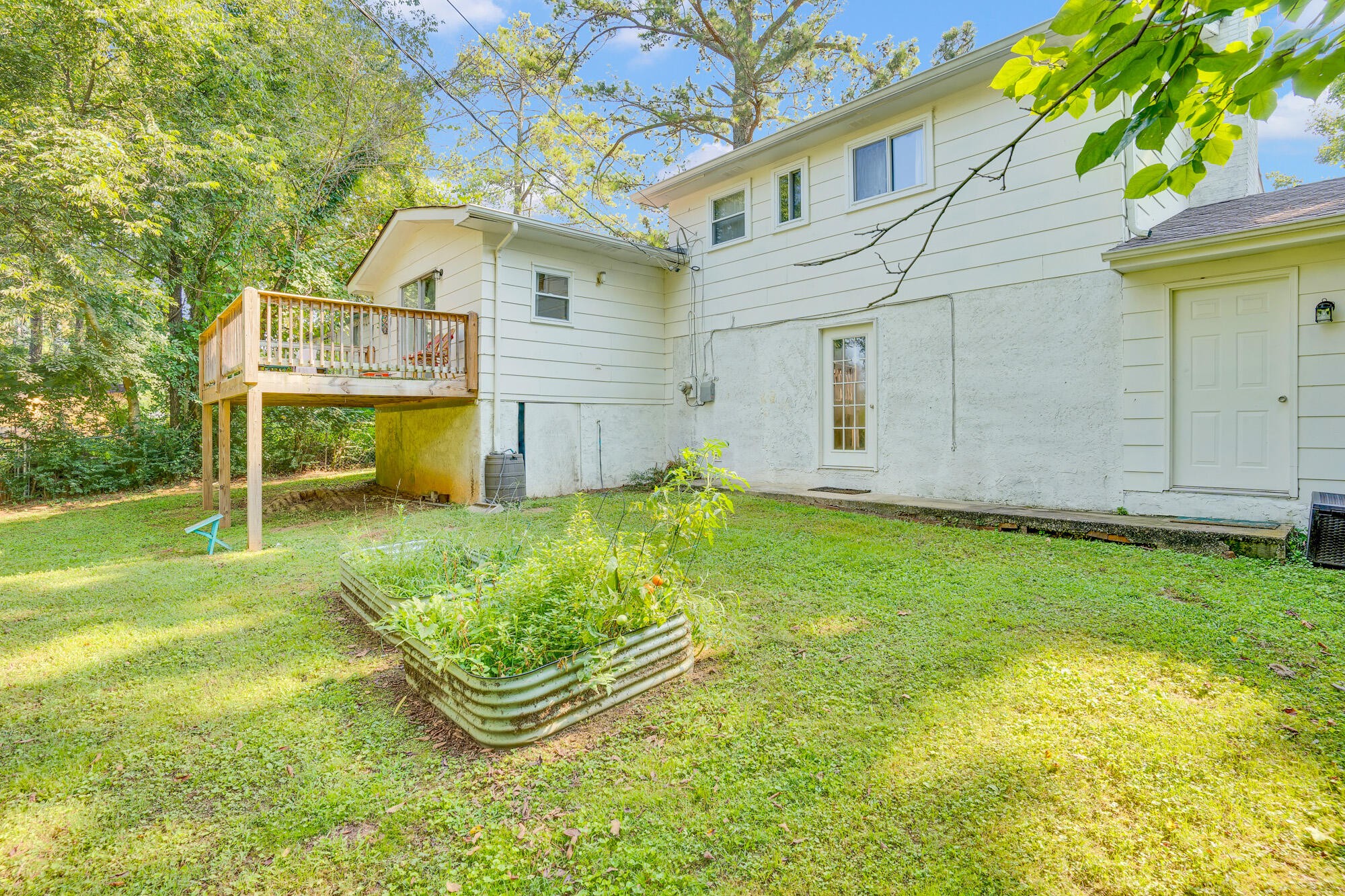 5961 Congress Lane Harrison, TN 37341 - Photo 29 of 30 a front view of a house with garden