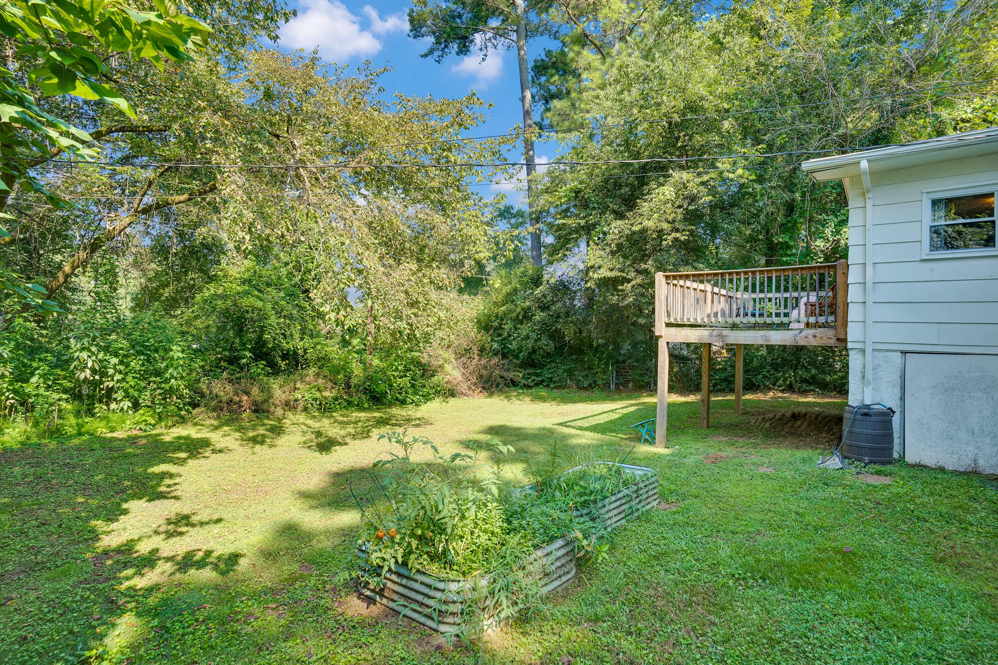 5961 Congress Lane Harrison, TN 37341 - Photo 30 of 30 a view of a backyard with a garden