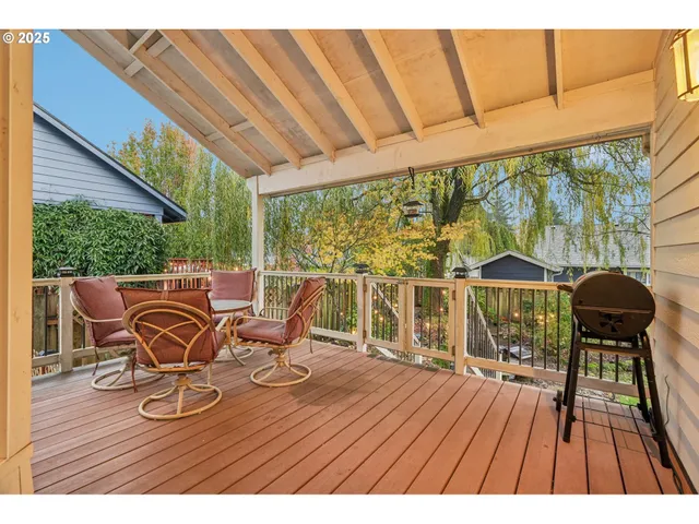 a view of a chairs and table in the patio