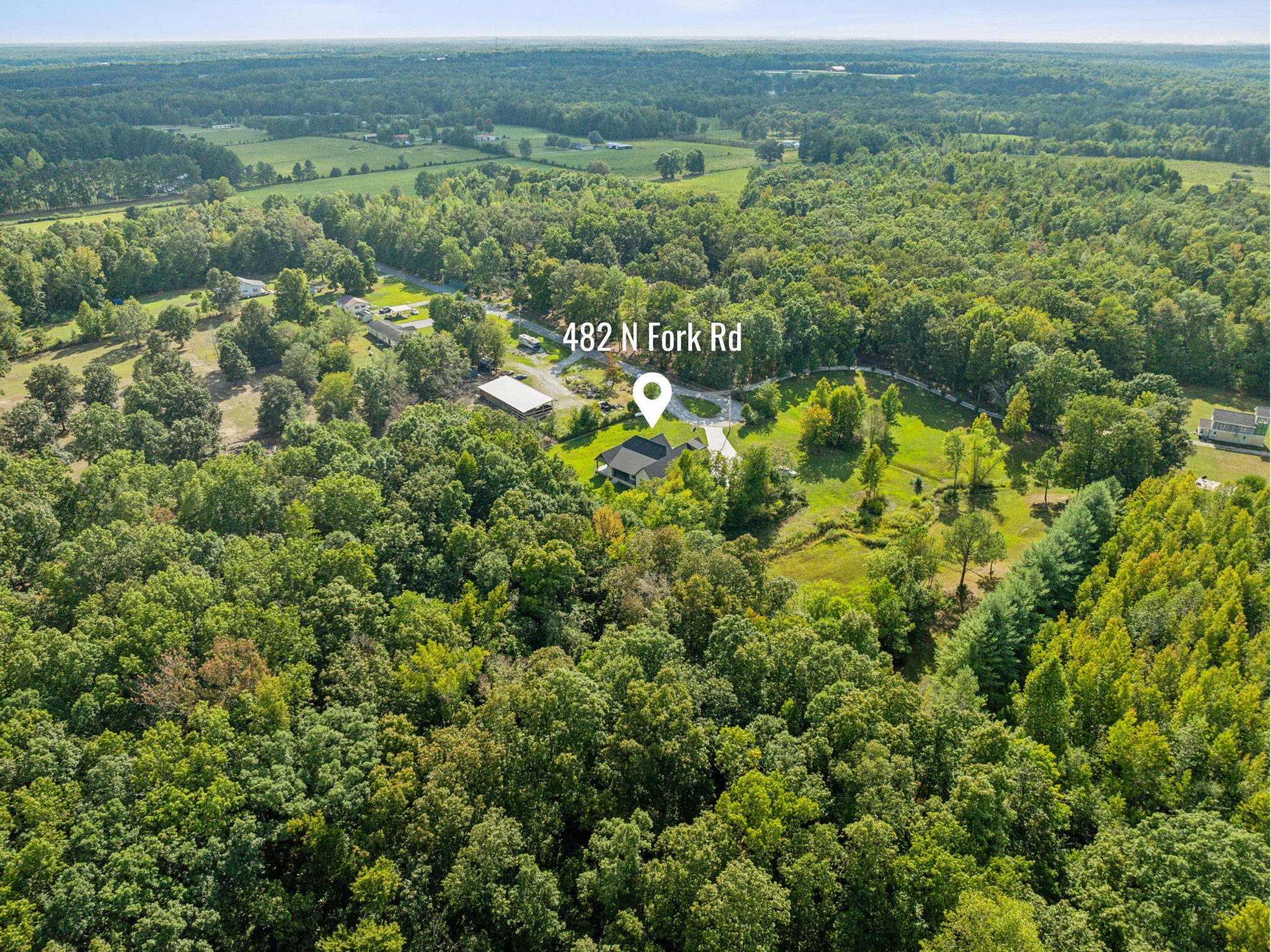 482 North Fork Road Manchester, TN 37355 - Photo 42 of 44 an aerial view of residential houses with outdoor space and trees