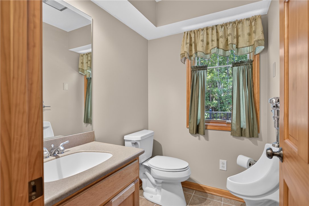 12 Lookout Lane Salem, SC 29676 - Photo 24 of 47 Updated half bathroom adjacent to the huge garage space.