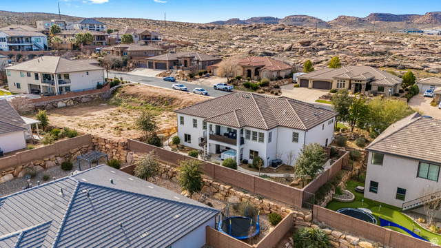 2311 South 1340 West St. George, UT 84770 - Photo 56 of 56 Aerial view of residential area featuring a mountain backdrop