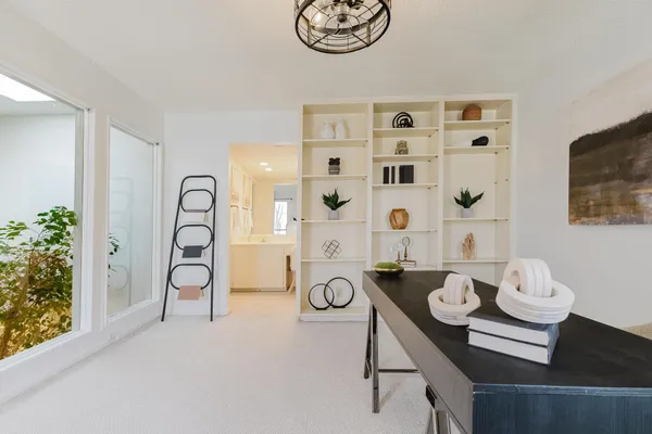 a living room with furniture and decor