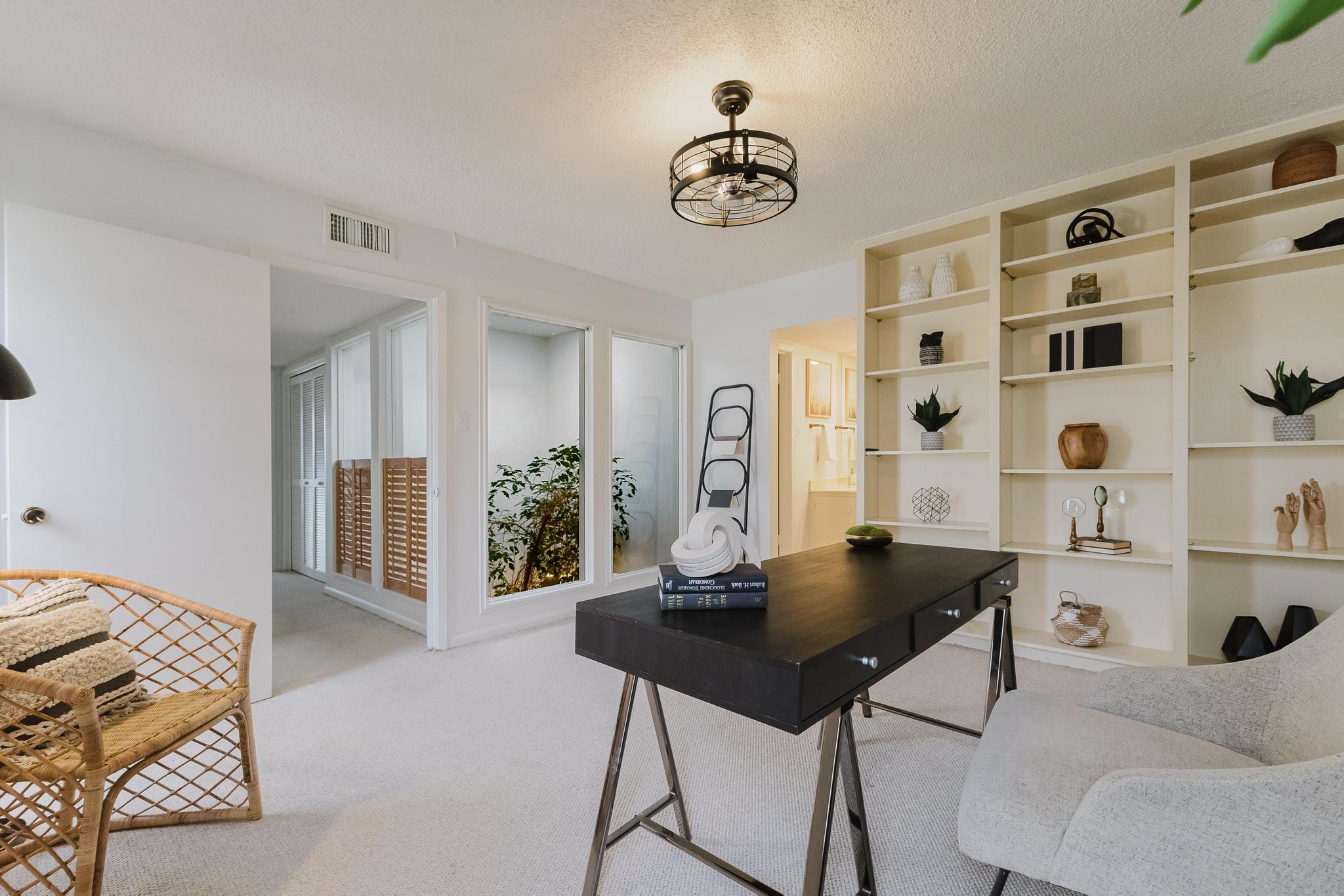 3500 Enfield Road, Unit F Austin, TX 78703 - Photo 16 of 22 a view of a livingroom with furniture and window
