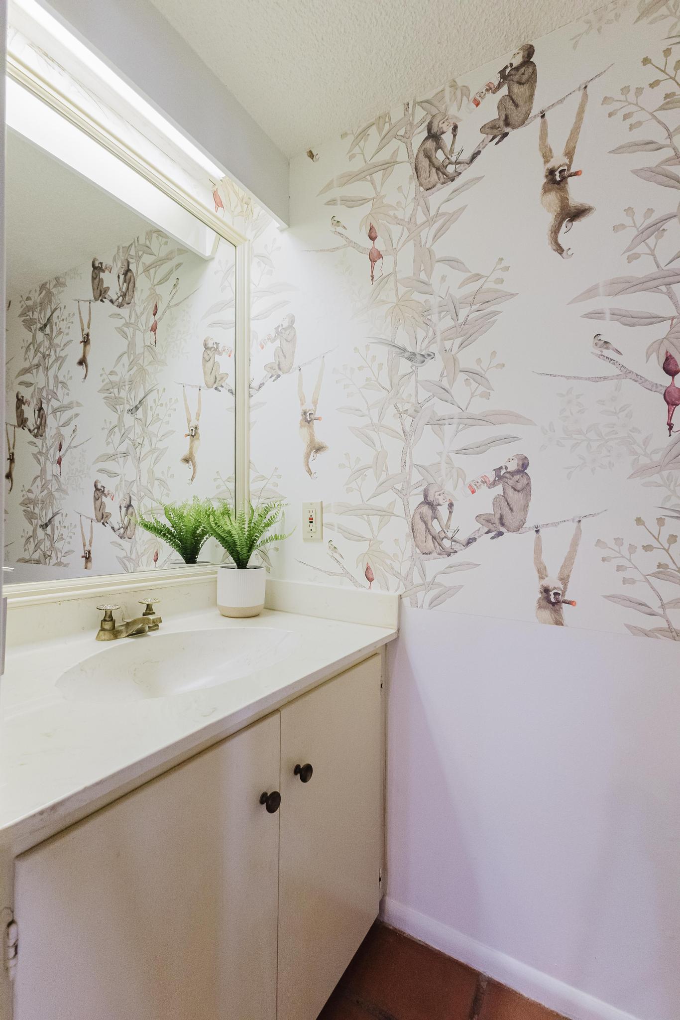 3500 Enfield Road, Unit F Austin, TX 78703 - Photo 20 of 22 a bathroom with a sink and mirror