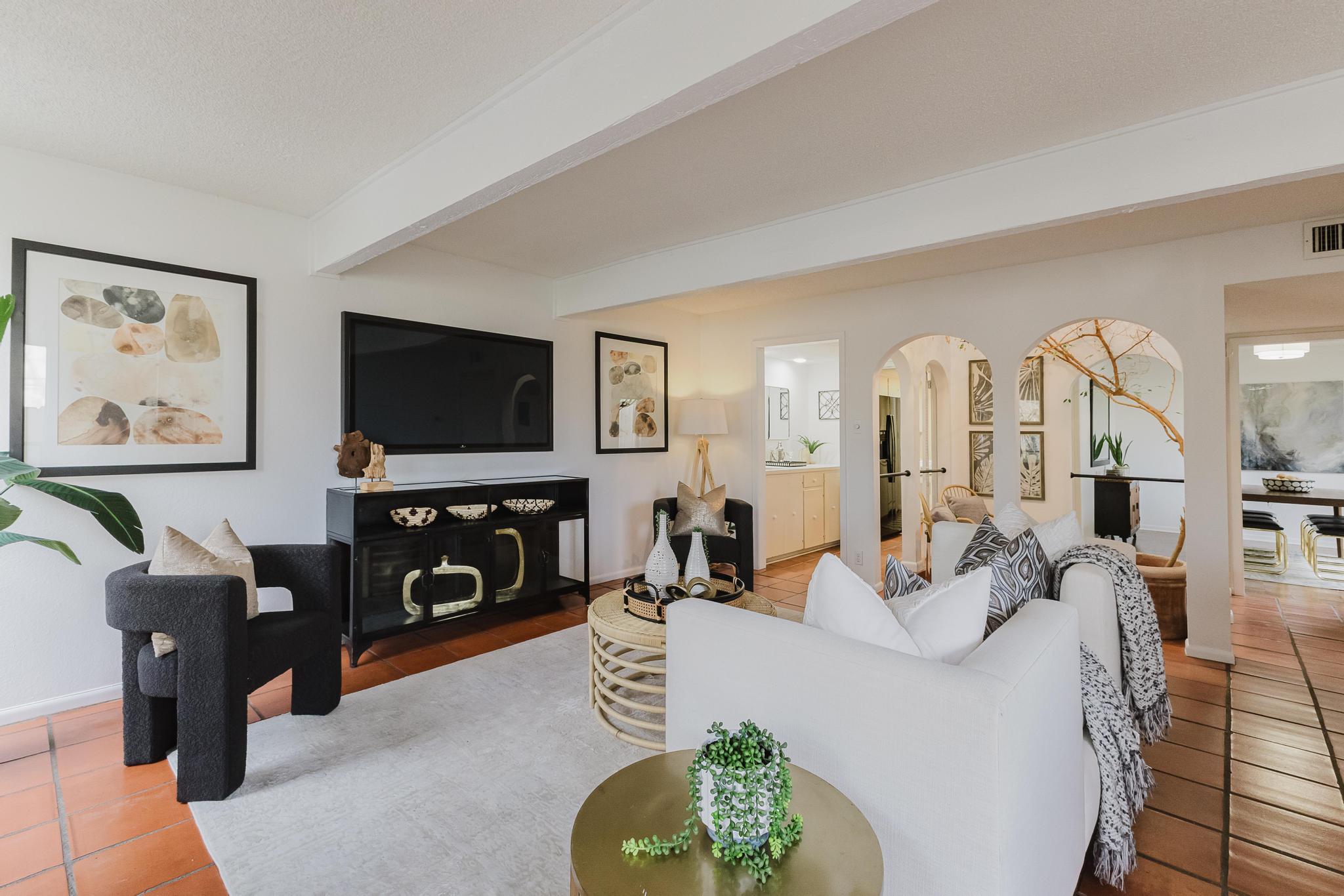 3500 Enfield Road, Unit F Austin, TX 78703 - Photo 2 of 22 a living room with furniture and a flat screen tv