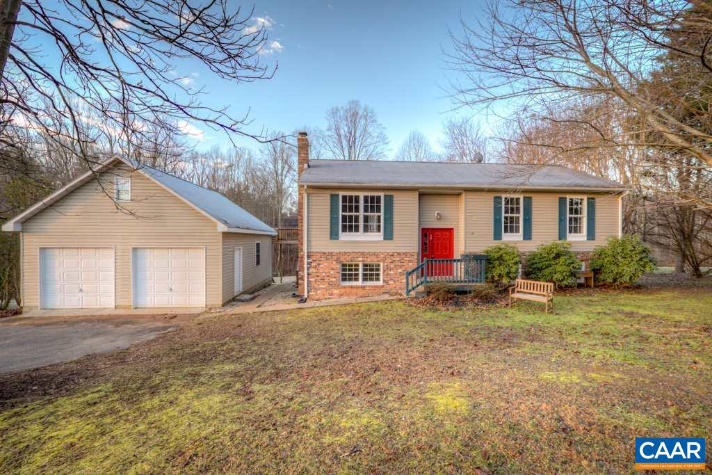 59 Narcissus Road Ruckersville, VA 22968 - Photo 1 of 35 a view of a house with a yard and large tree