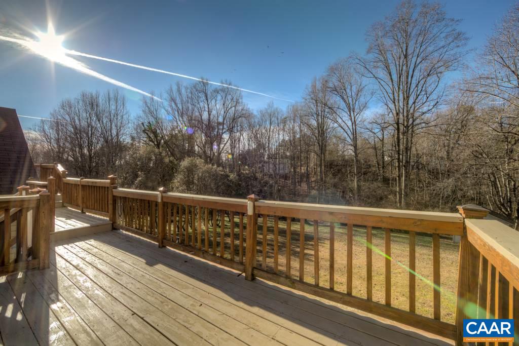 59 Narcissus Road Ruckersville, VA 22968 - Photo 26 of 35 a view of a balcony with wooden floor and fence