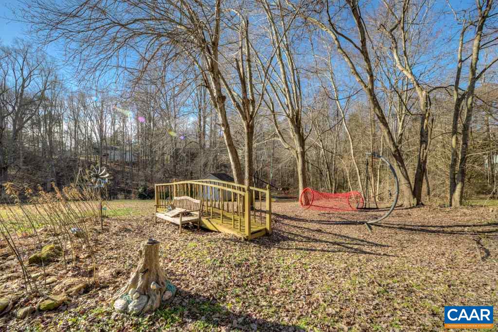 59 Narcissus Road Ruckersville, VA 22968 - Photo 29 of 35 a backyard of a house with wooden fence