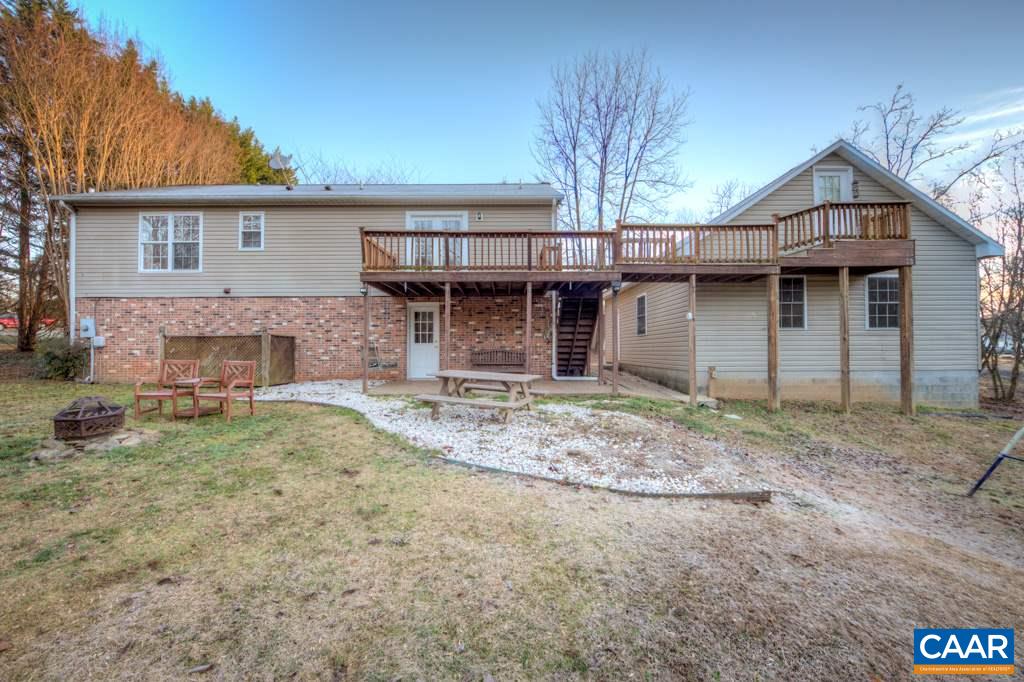 59 Narcissus Road Ruckersville, VA 22968 - Photo 30 of 35 a view of a house with a yard and roof