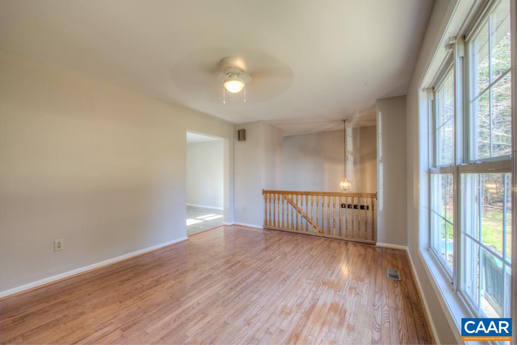 59 Narcissus Road Ruckersville, VA 22968 - Photo 5 of 35 a view of a room with wooden floor and windows