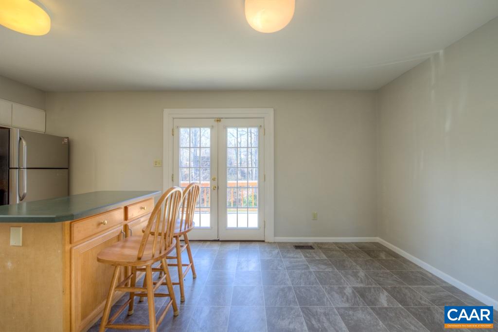 59 Narcissus Road Ruckersville, VA 22968 - Photo 10 of 35 a view of an empty room with wooden floor and a window