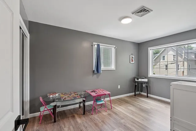 a room with furniture and a window