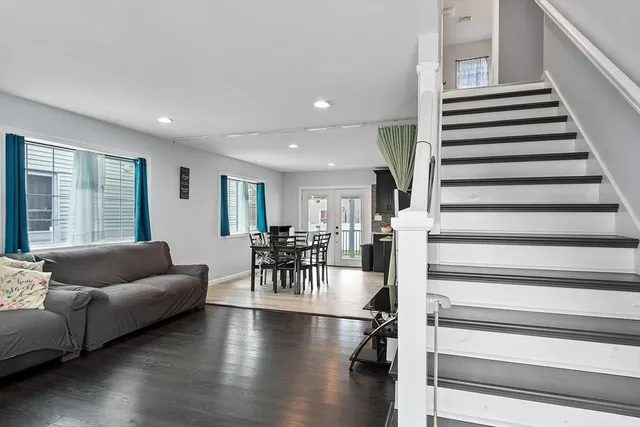 a living room with furniture and a table