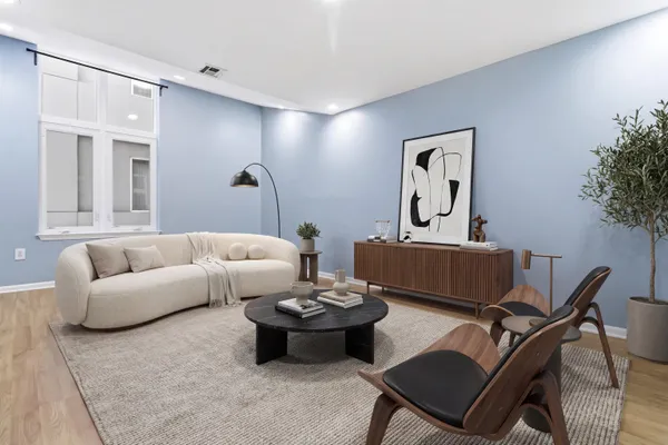 a view of a livingroom with a furniture