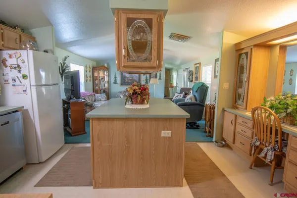 a view of living room with furniture and a window
