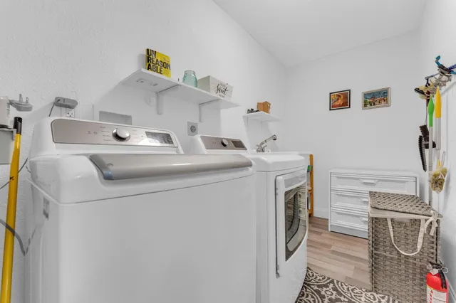 a utility room with dryer and washer