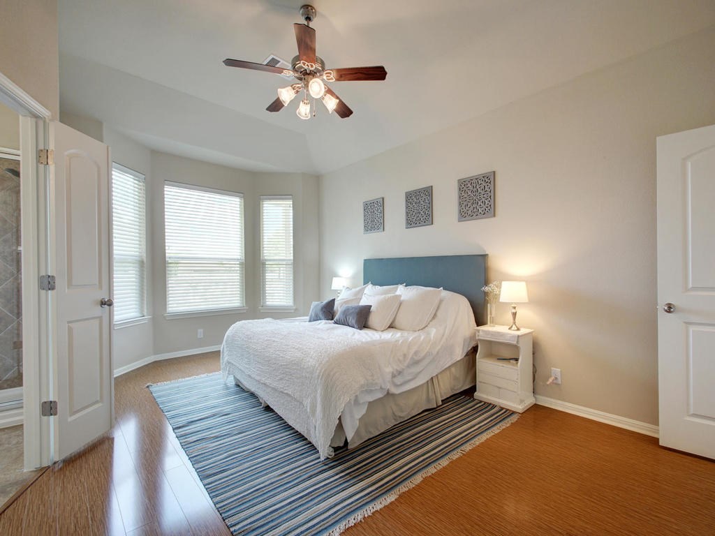 13900 Marathon Road Austin, TX 78717 - Photo 16 of 30 Master bedroom has bay window. This photo is from when owner lived in the property.