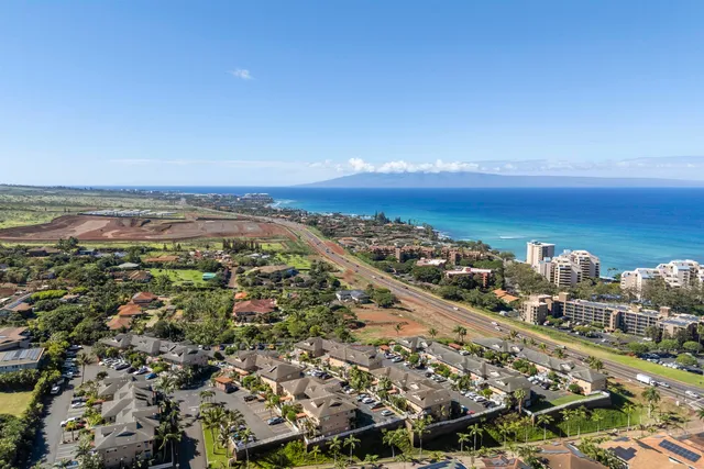 a view of a city with an ocean