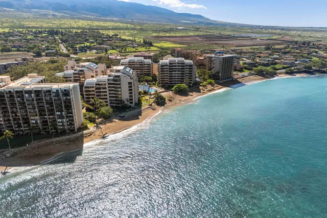 a view of a city with an ocean view