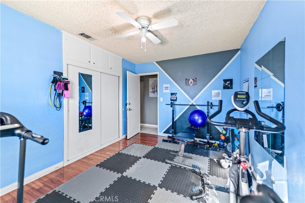 152 East Rosewood Street Rialto, CA 92376 - Photo 14 of 30 a view of a room with musical instruments