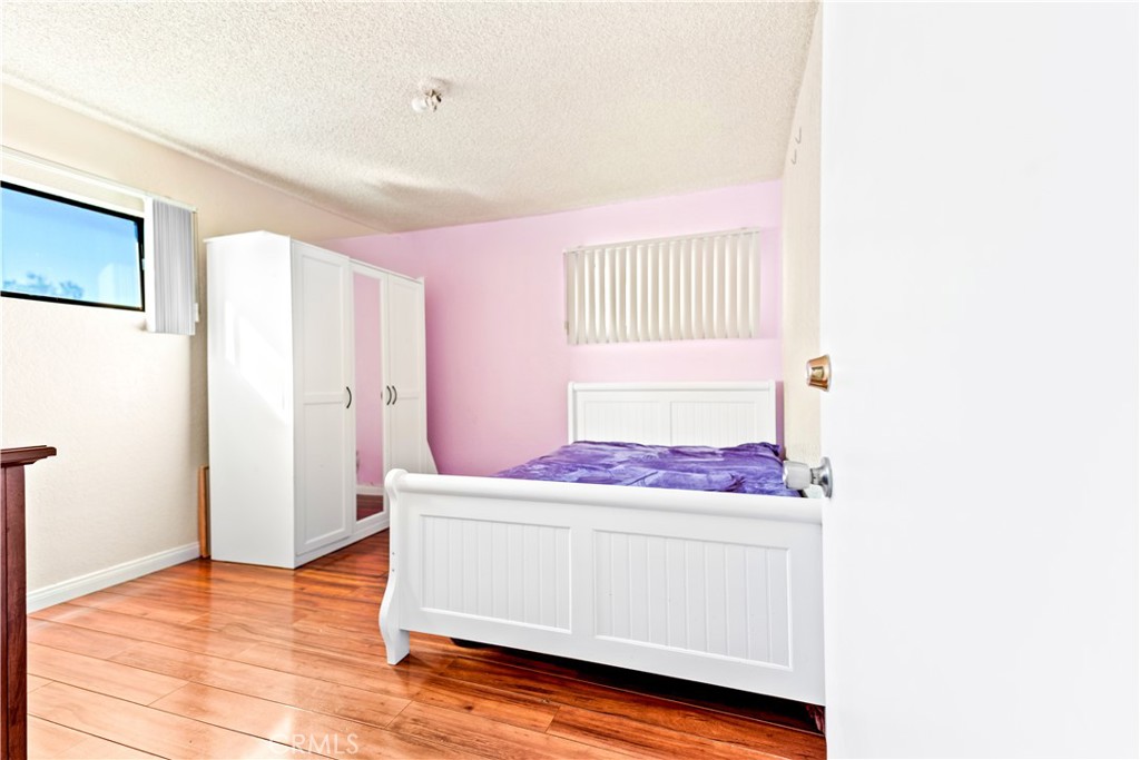 152 East Rosewood Street Rialto, CA 92376 - Photo 19 of 30 a room with table and chair