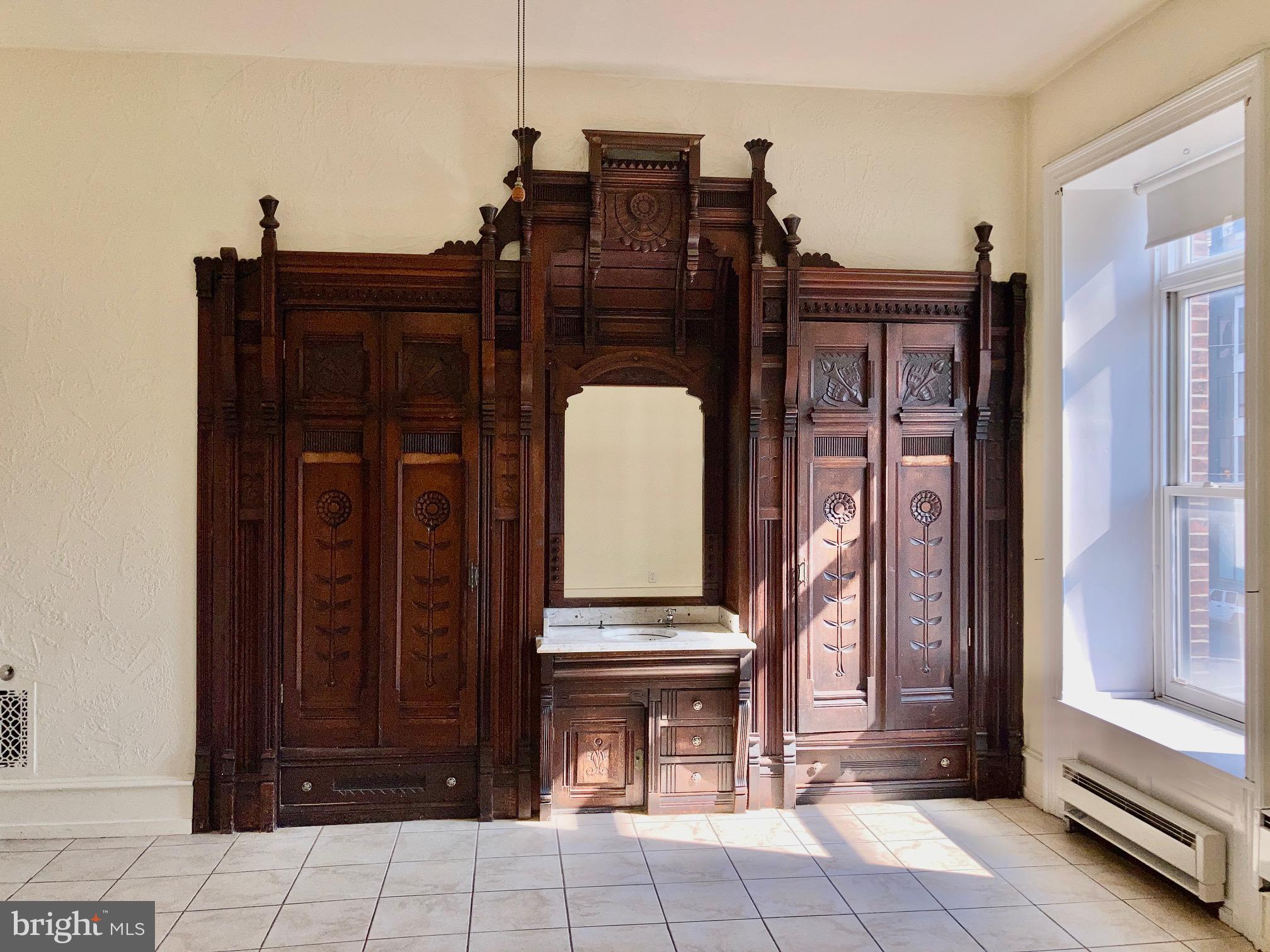 1122 South Broad Street, Unit 2R Philadelphia, PA 19146 - Photo 6 of 10 a view of entryway with a door and wooden floor