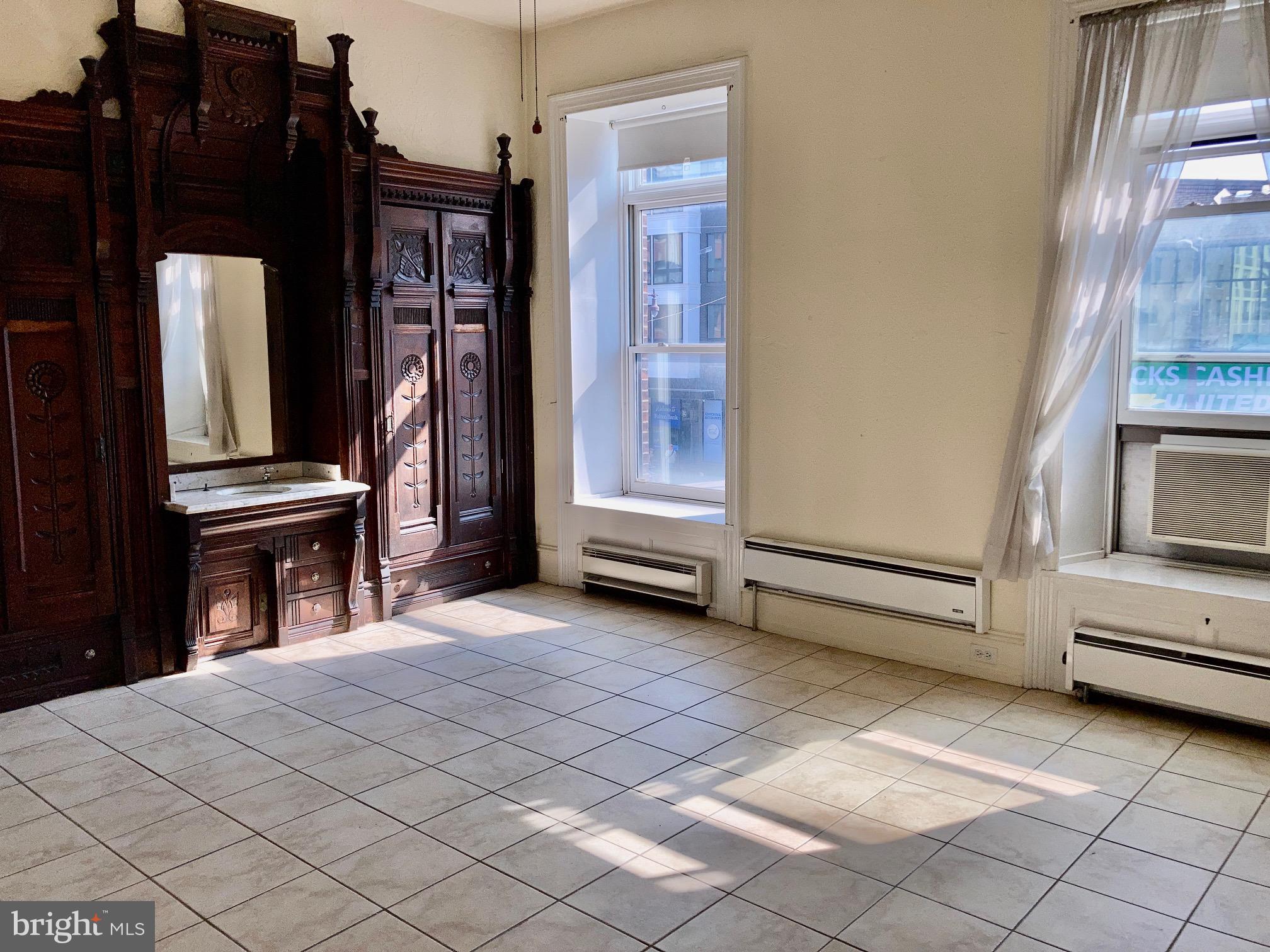 1122 South Broad Street, Unit 2R Philadelphia, PA 19146 - Photo 7 of 10 a view of livingroom with furniture