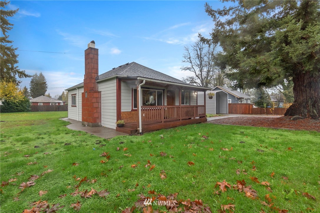 18349 Albany Street Southwest Rochester, WA 98579 - Photo 1 of 21 a front view of a house with garden