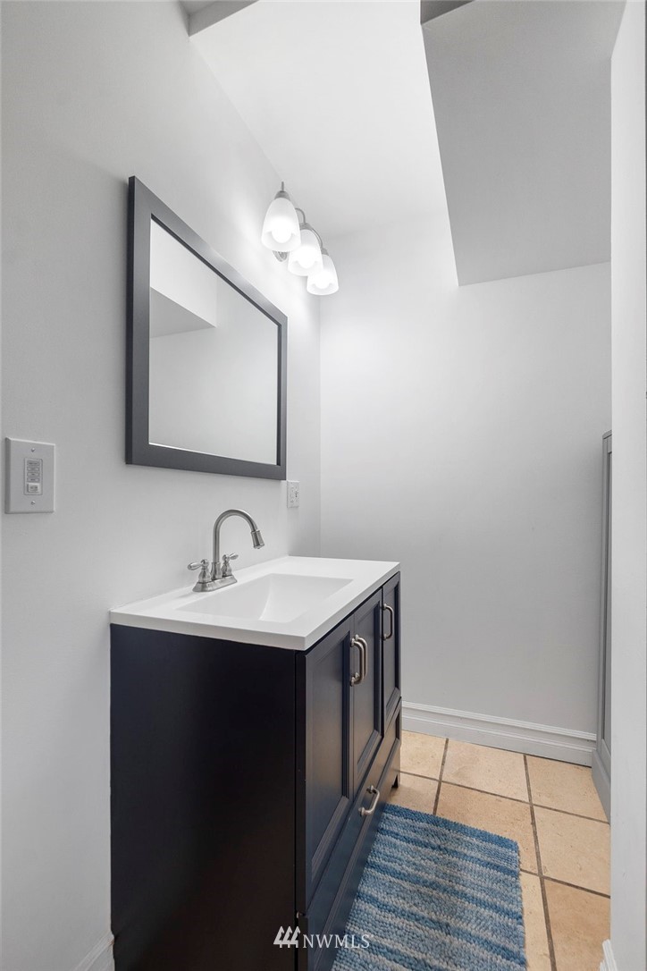18349 Albany Street Southwest Rochester, WA 98579 - Photo 13 of 21 a bathroom with a sink and a mirror