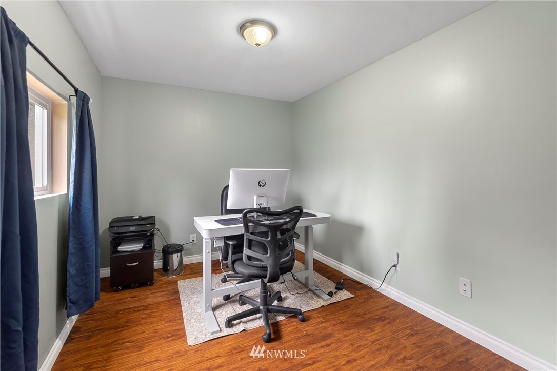 18349 Albany Street Southwest Rochester, WA 98579 - Photo 19 of 21 a workspace with furniture and wooden floor