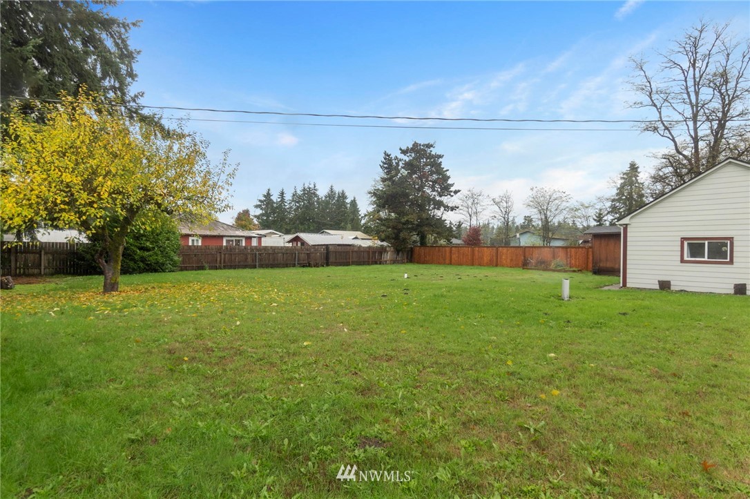 18349 Albany Street Southwest Rochester, WA 98579 - Photo 21 of 21 a view of yard with green space and house in the background